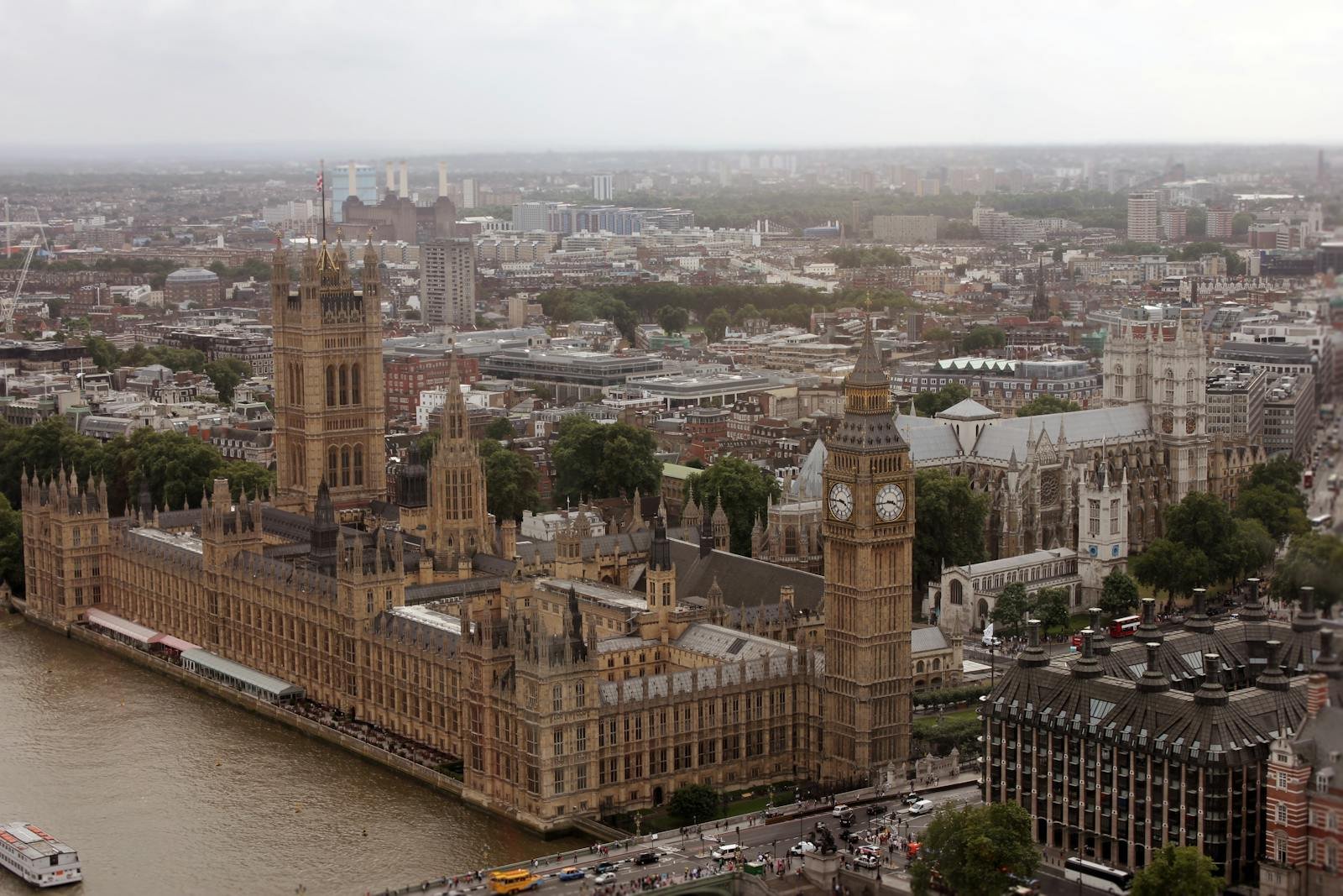 Drone view of the historic Palace of Westminster and Big Ben along the River Thames in London.
